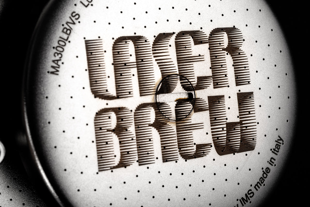Close-up of the laser-engraved IMS Laser Brew shower screen